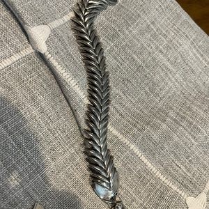 Sterling Silver stamped 925 fish bracelet. Approximately 7”